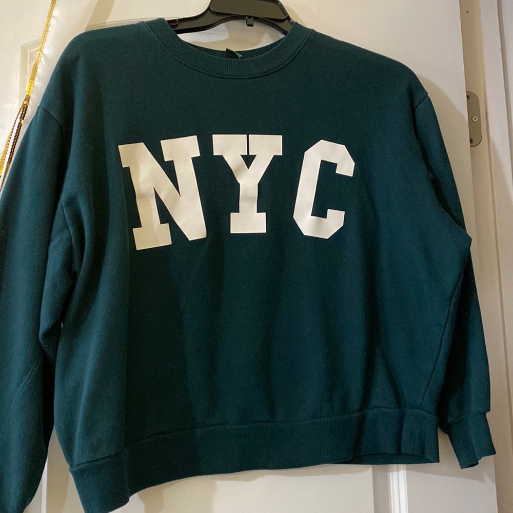 Comfy and cute dark green NYC crew neck!
